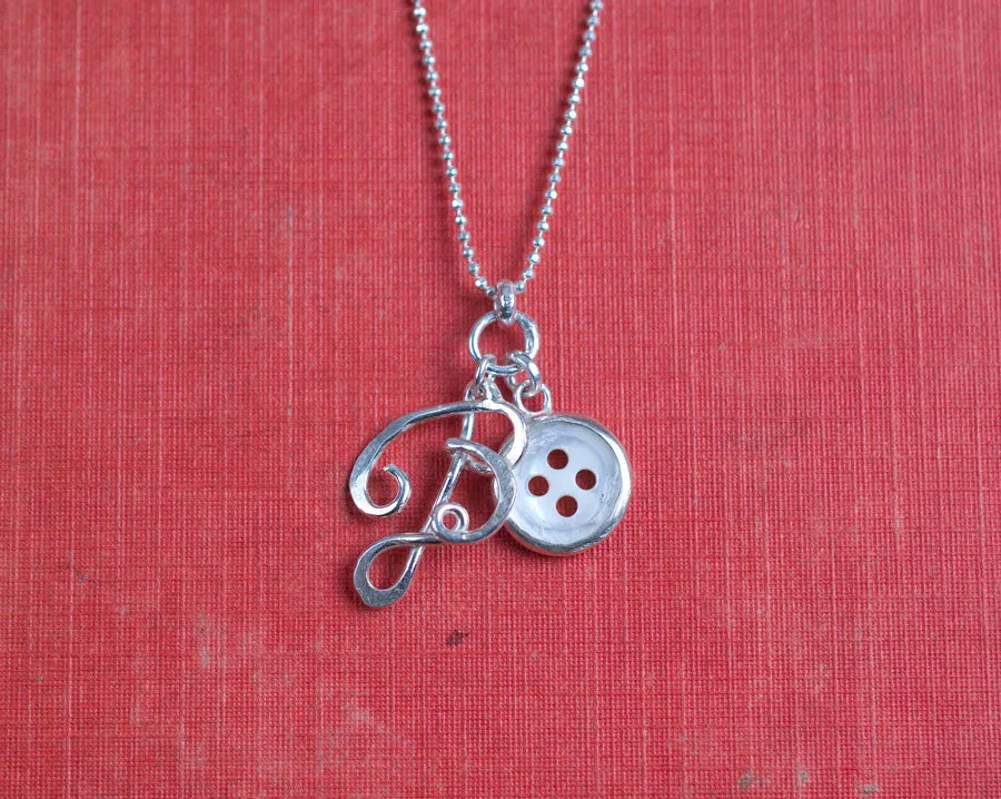 B with button necklace