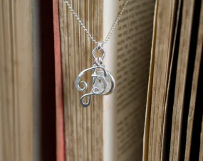 B with button necklace