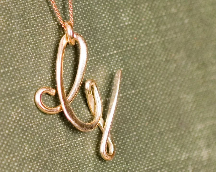 G necklace 9ct yellow gold