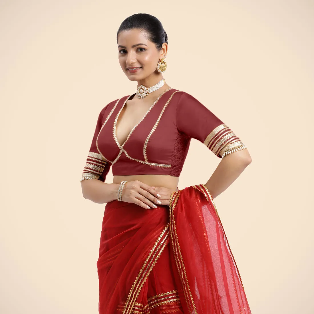 Nafeeza x Tyohaar | Auburn Red Embellished Elbow Sleeves FlexiFit™ Saree Blouse with Plunging V Neckline with Tasteful Golden Gota Lace