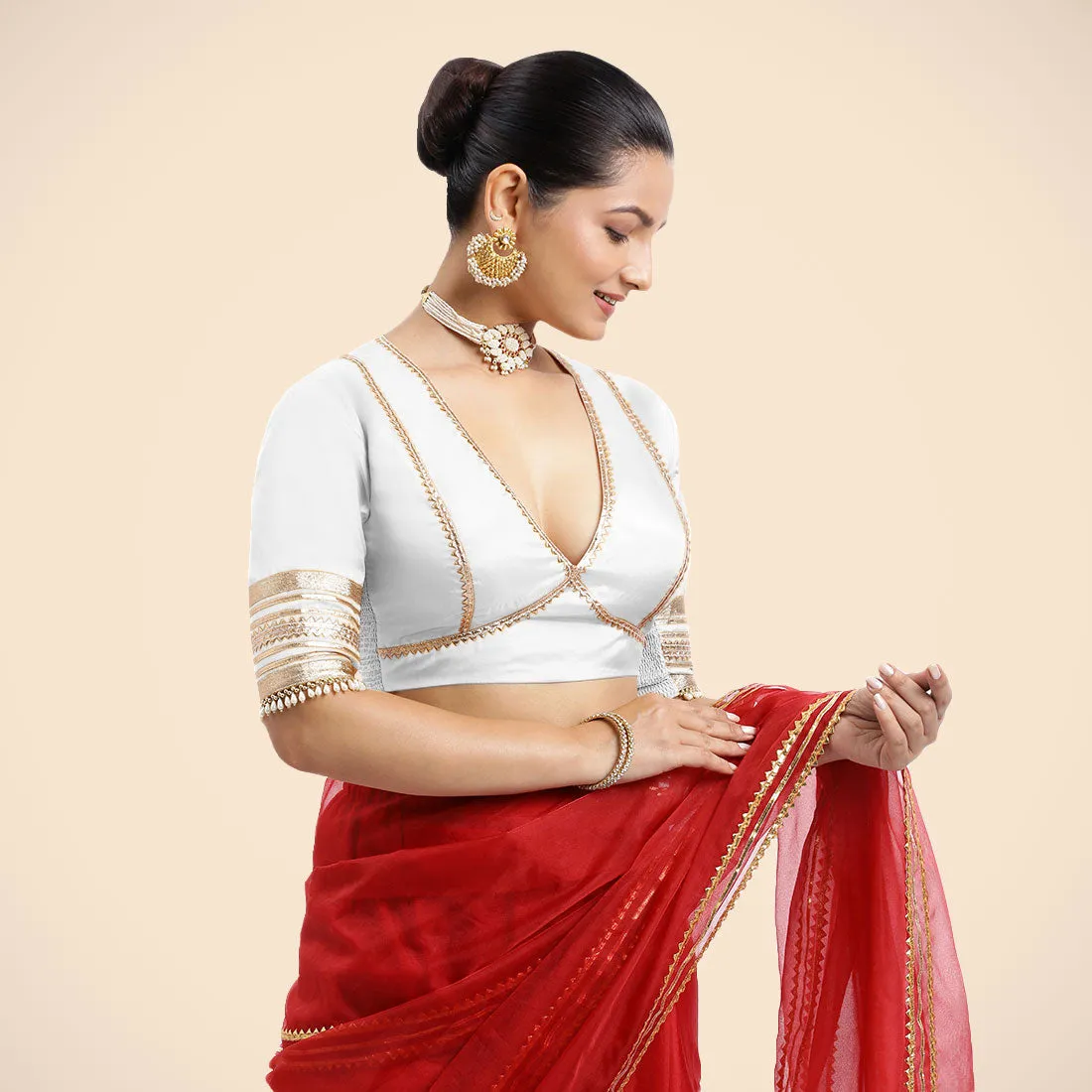 Nafeeza x Tyohaar | Pearl White Embellished Elbow Sleeves FlexiFit™ Saree Blouse with Plunging V Neckline with Tasteful Golden Gota Lace